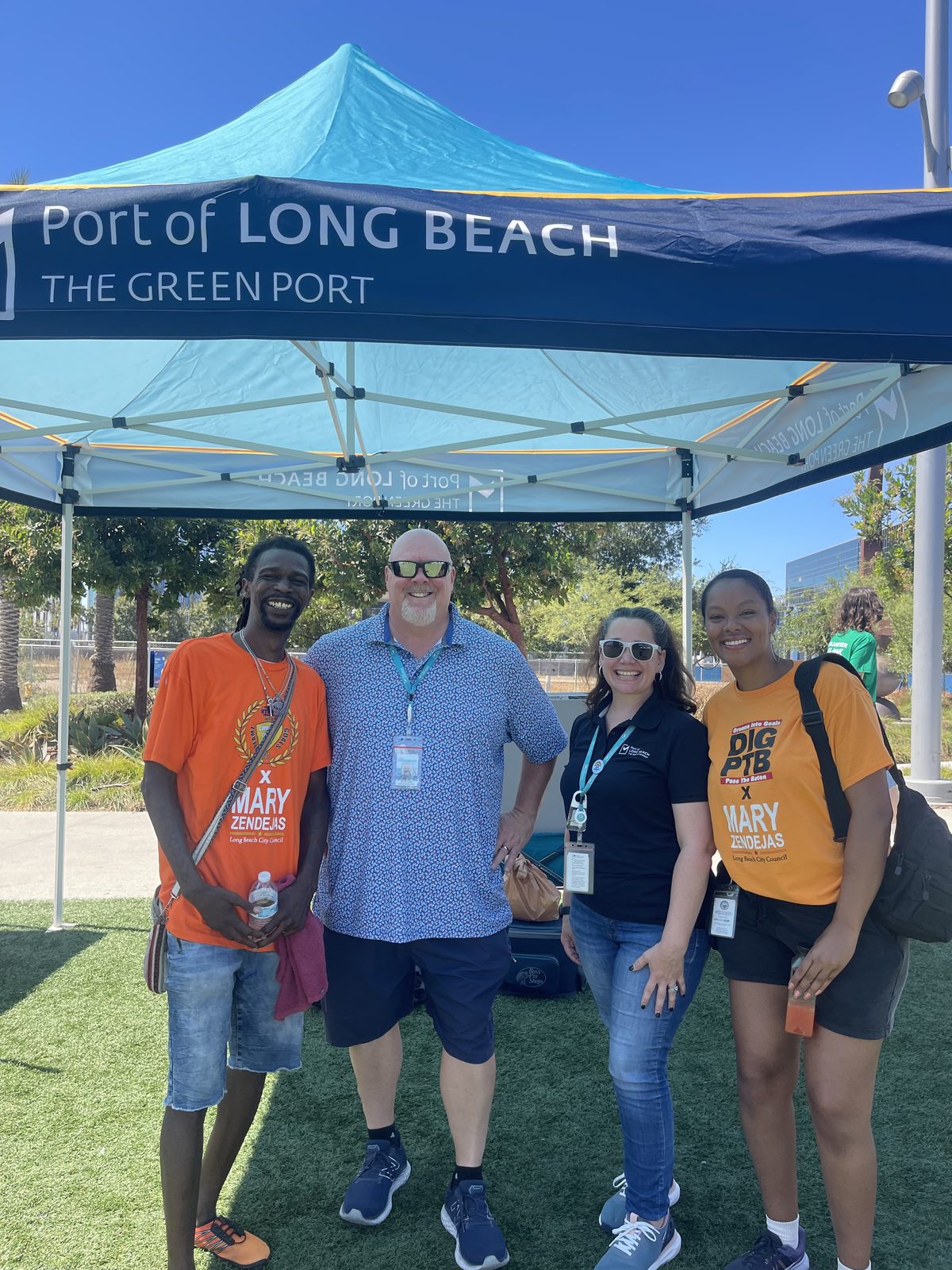 DIG LIFE team members and City partners together under the Port of Long Beach tent.